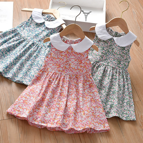 Moderna haljina s ovalnim izrezom i gumbima za djevojčice