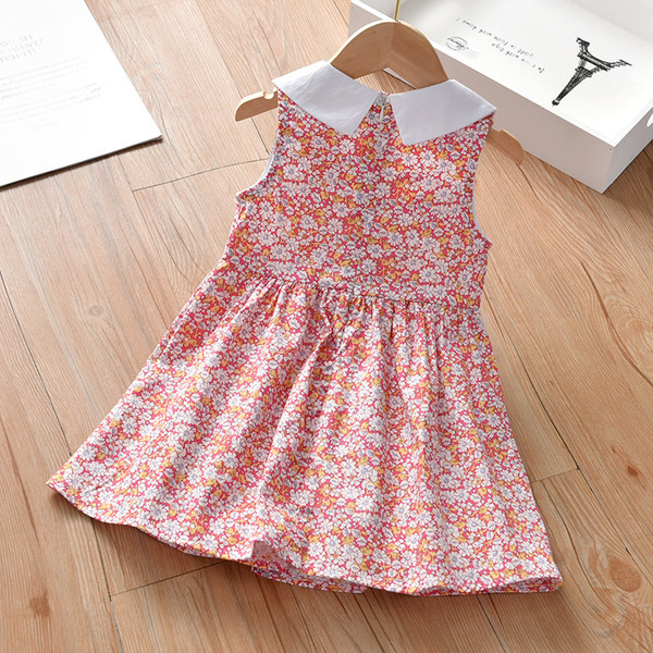 Moderna haljina s ovalnim izrezom i gumbima za djevojčice