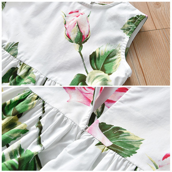 Moderna dječja haljina s okruglim izrezom bijele boje