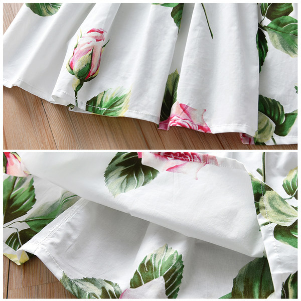 Moderna dječja haljina s okruglim izrezom bijele boje