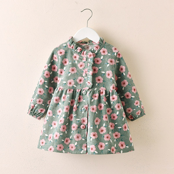 Laste kaasaegne pikkade varrukate ja nööpidega kleit