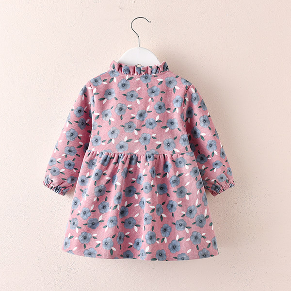 Laste kaasaegne pikkade varrukate ja nööpidega kleit