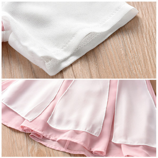 Vaikiška suknelė su V formos iškirpte ir siuvinėjimu