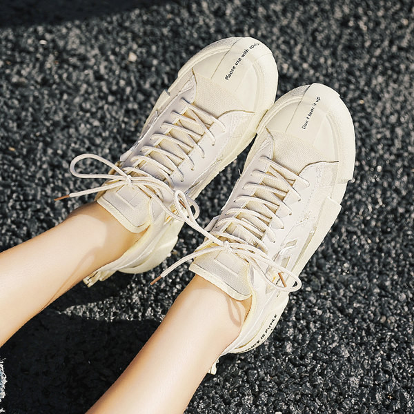 Naiste tossud beeži ja musta pealdisega