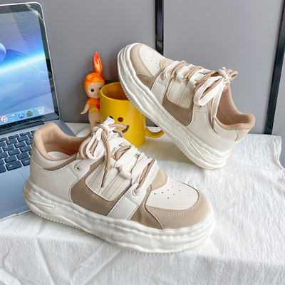 Fekete és bézs színű, fűzős női tornacipő