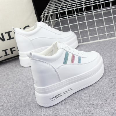 Women`s platform sneakers in white color