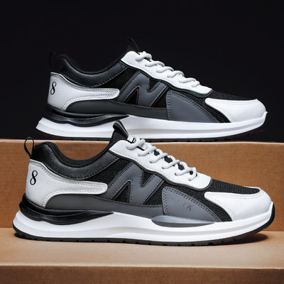 Kahes värvitoonis ja lameda tallaga meeste tossud