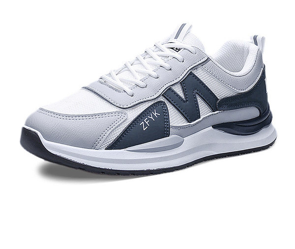 Kahes värvitoonis ja lameda tallaga meeste tossud