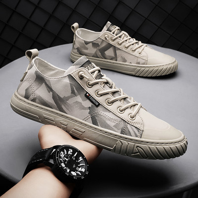 Tekstiilist valmistatud meeste vabaaja tossud lipsude ja pealdisega