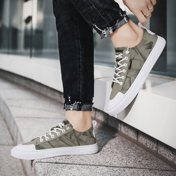 Tekstiilist valmistatud meeste vabaaja tossud lipsude ja pealdisega