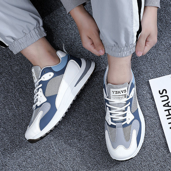 Sinise ja musta võrguga meeste tossud