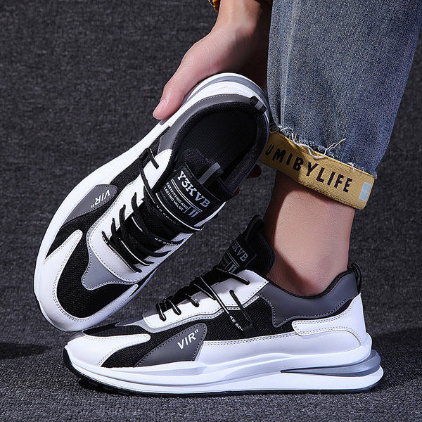 Meeste vabaaja sportlikud hingavad tossud pealdisega