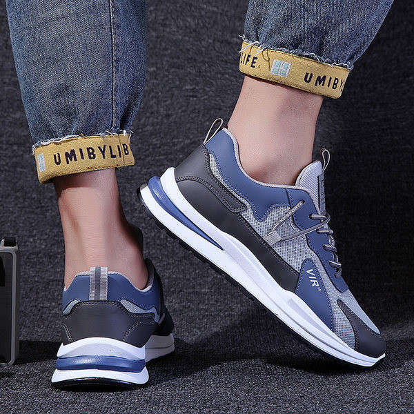 Meeste vabaaja sportlikud hingavad tossud pealdisega