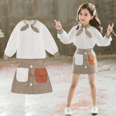 Модерен комплект за момичета от две части -риза и карирана пола