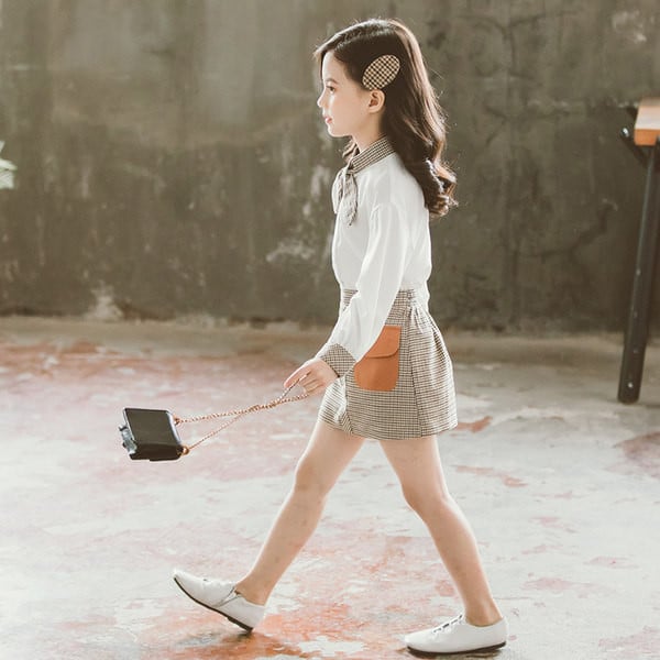 Модерен комплект за момичета от две части -риза и карирана пола