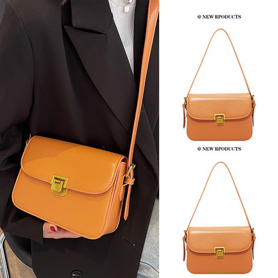 Изчистен модел дамска чанта от еко кожа с дълга дръжка и метално закопчаване