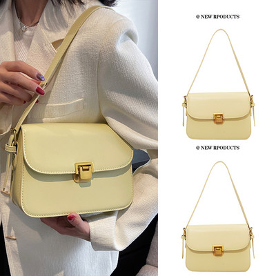 Изчистен модел дамска чанта от еко кожа с дълга дръжка и метално закопчаване