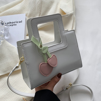 Модерна дамска чанта от изкуствена кожа с две дръжки