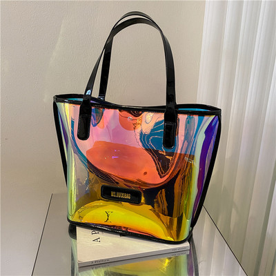 Прозрачна дамска чанта с надпис и метално закопчаване