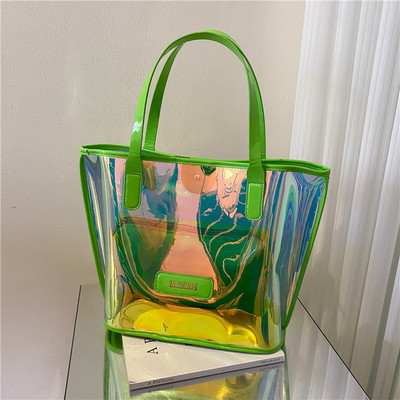 Прозрачна дамска чанта с надпис и метално закопчаване