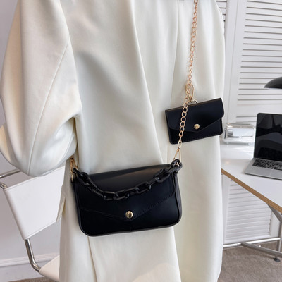 Нов модел малка дамска чанта от еко кожа с две дръжки