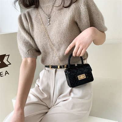 Дамска мини силиконова чанта с метално закопчаване 