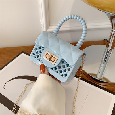 Дамска мини силиконова чанта с метално закопчаване 