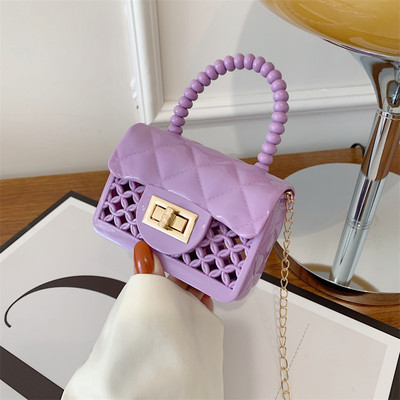 Дамска мини силиконова чанта с метално закопчаване 