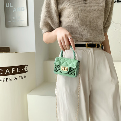 Дамска мини силиконова чанта с метално закопчаване 