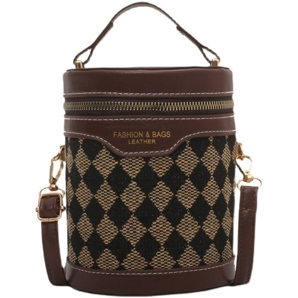 Ženska torba u obliku cilindra sa životinjskim uzorkom