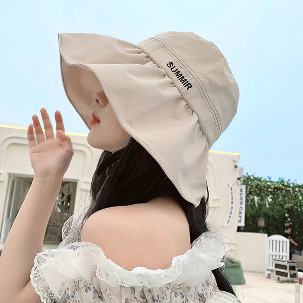 Naiste tasuline lipsudega müts mitmes värvitoonis