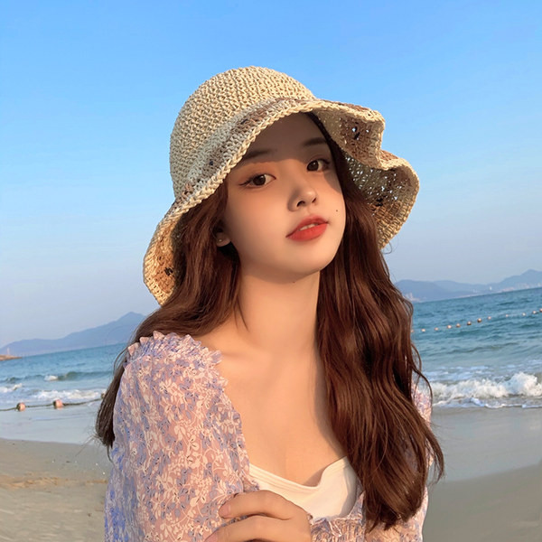 Naiste kootud päikesemüts