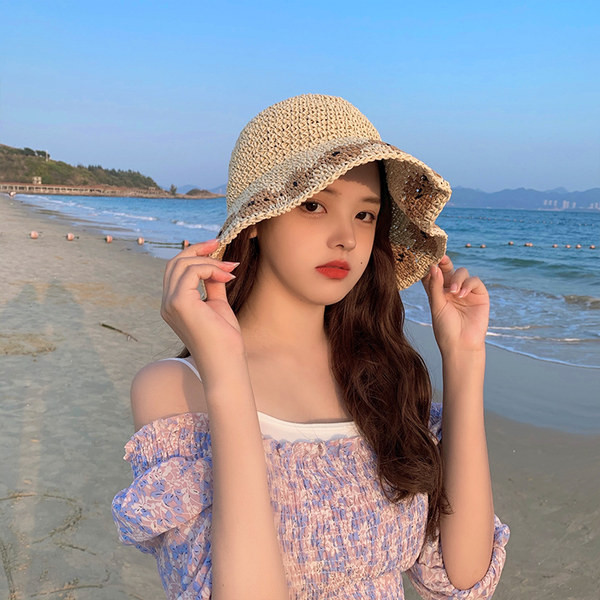 Naiste kootud päikesemüts