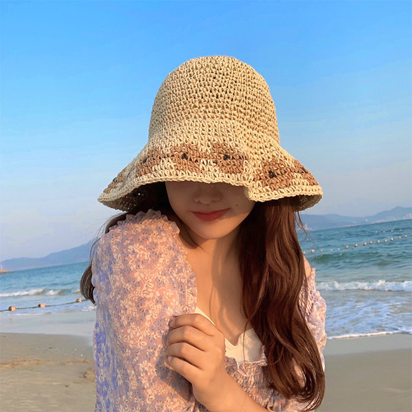 Naiste kootud päikesemüts