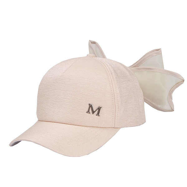 Metallist kaunistuse ja paelaga visiiriga naiste müts