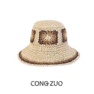 Ääre ja trükiga naiste õlgkübar