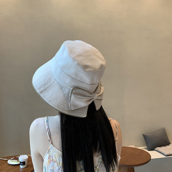 Naiste vabaaja müts paelaga