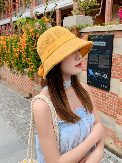 Naiste vabaaja müts paela ja väikese äärega