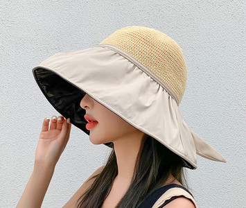 Μοντέρνο γυναικείο καπέλο με μεγάλη περιφέρια και κορδέλα