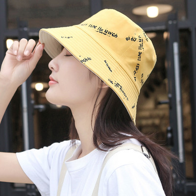 Naiste tekstiilist suvine idioodimüts kirjaga