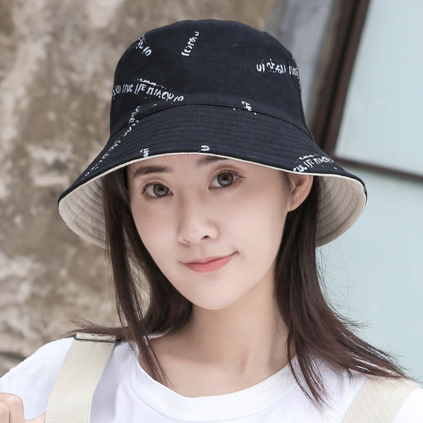 Naiste tekstiilist suvine idioodimüts kirjaga