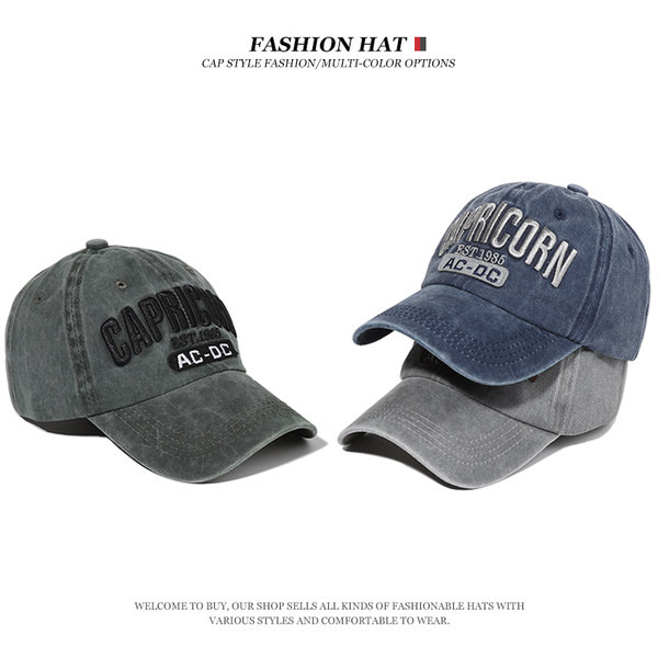 Visiiri ja tikitud pealdisega meeste pesapallimüts