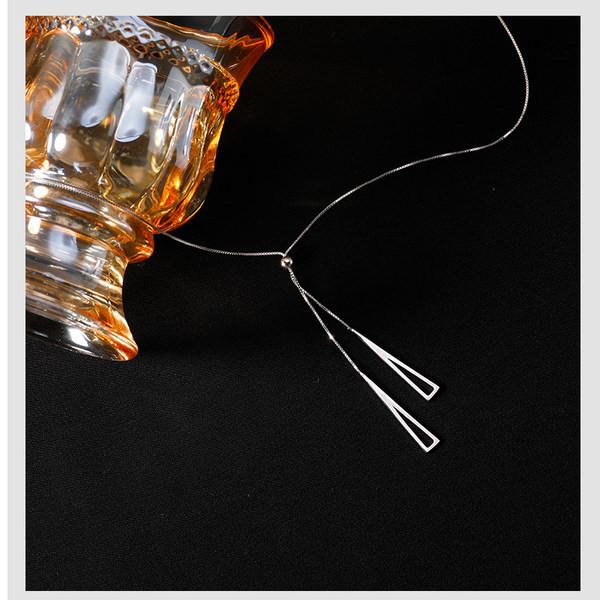 Ženska ogrlica sa privjescima - u dvije boje