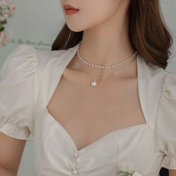 Μοντέρνο γυναικείο κολιέ διπλό με πέρλες