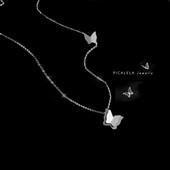 Γυναικείο κολιέ με πεταλούδες σε ασημί χρώμα