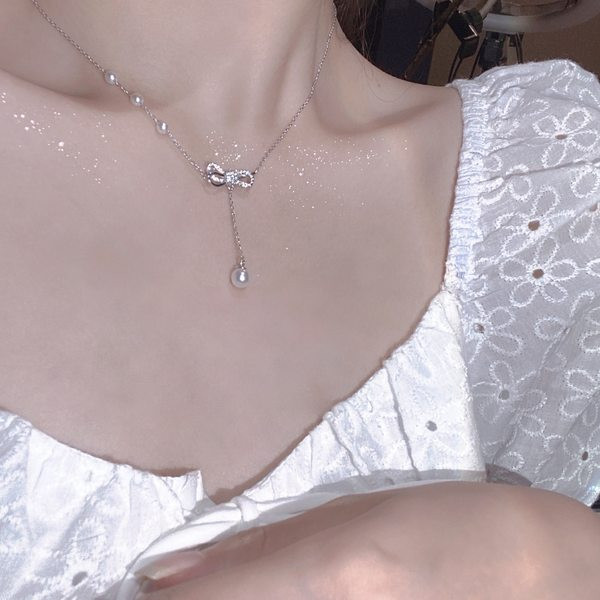 Naiste õhuke kett ripatsi ja pärlitega