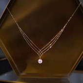 Μοντέρνο γυναικείο κολιέ με  μενταγιόν πέρλα