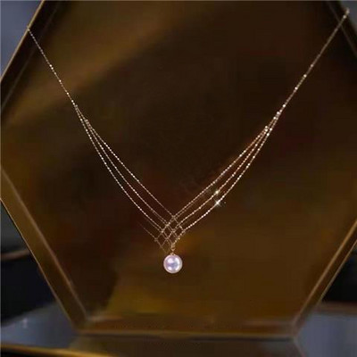 Μοντέρνο γυναικείο κολιέ με  μενταγιόν πέρλα