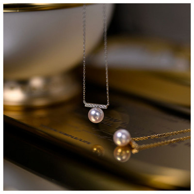 Μοντέρνο γυναικείο κολιέ με πέρλες και πέτρες