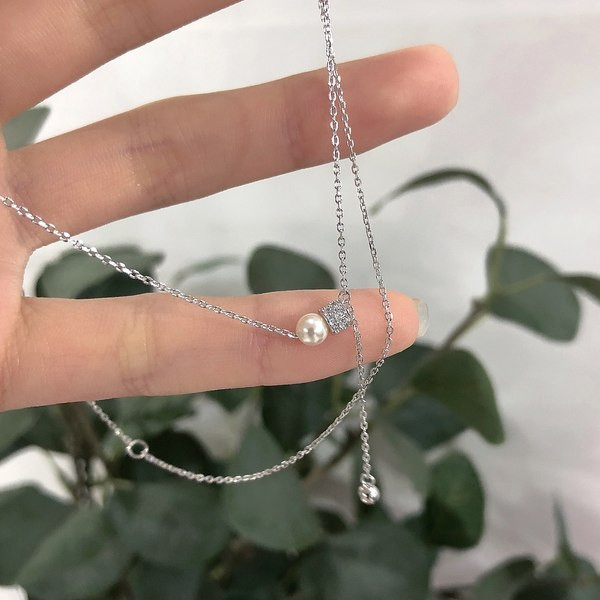 Κομψό κολιέ με διακοσμητικό μαργαριτάρι